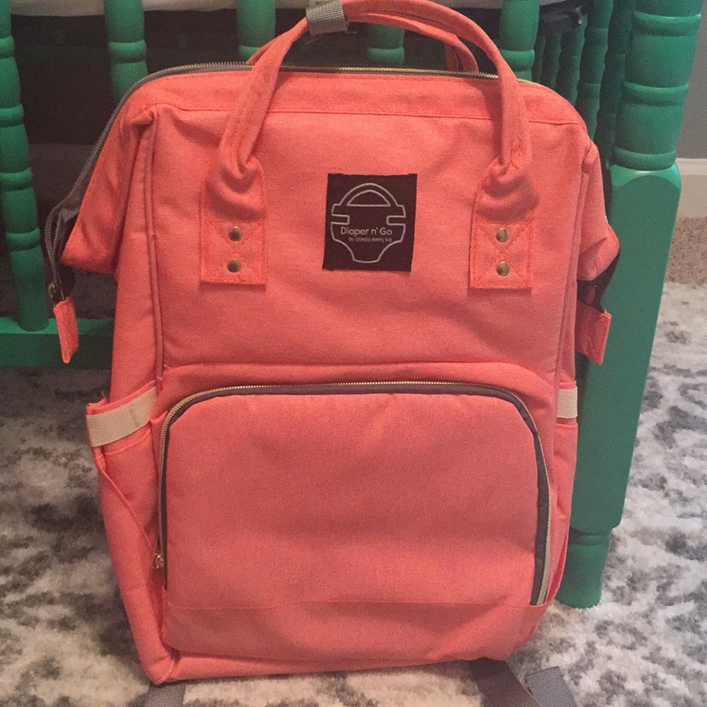 Coral orange Diaper n’ Go diaper bag brand new!
